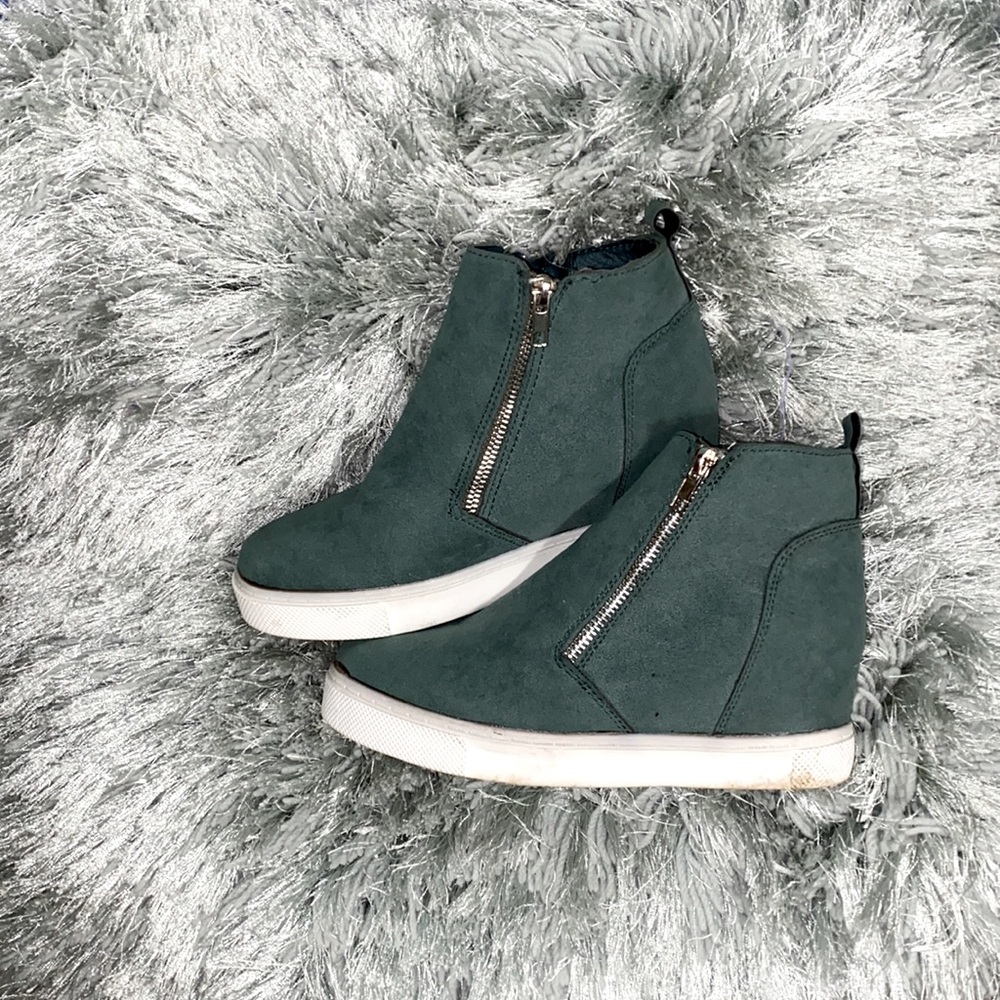 Green wedge sneakers.